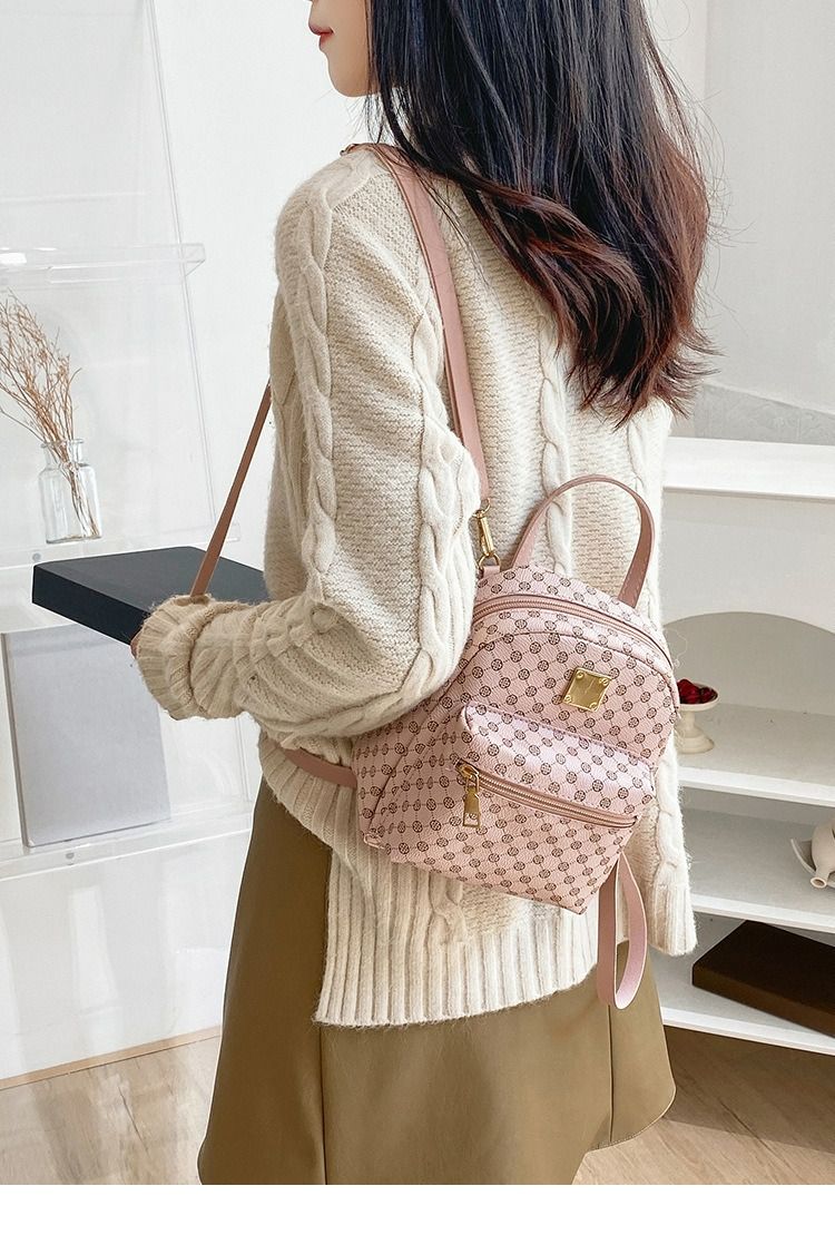Ladies front pocket printed small backpack 2024 autumn and winter Korean version of the new product personality daily change small bag