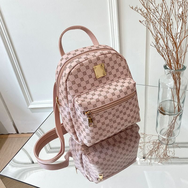 Ladies front pocket printed small backpack 2024 autumn and winter Korean version of the new product personality daily change small bag