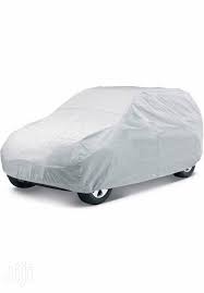 Universal Grey Car Cover, Waterproof, Breathable, Scratch & Weather Resistant, Protects Against Rain, Snow, and Heat