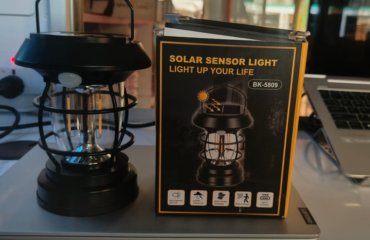 Solar Sensor Light, Motion-Activated Outdoor Lamp, Dual Power Solar & Electric, Ideal for Camping, Hiking, Garden, and Home Decor