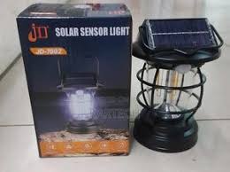 Solar Sensor Light, Motion-Activated Outdoor Lamp, Dual Power Solar & Electric, Ideal for Camping, Hiking, Garden, and Home Decor