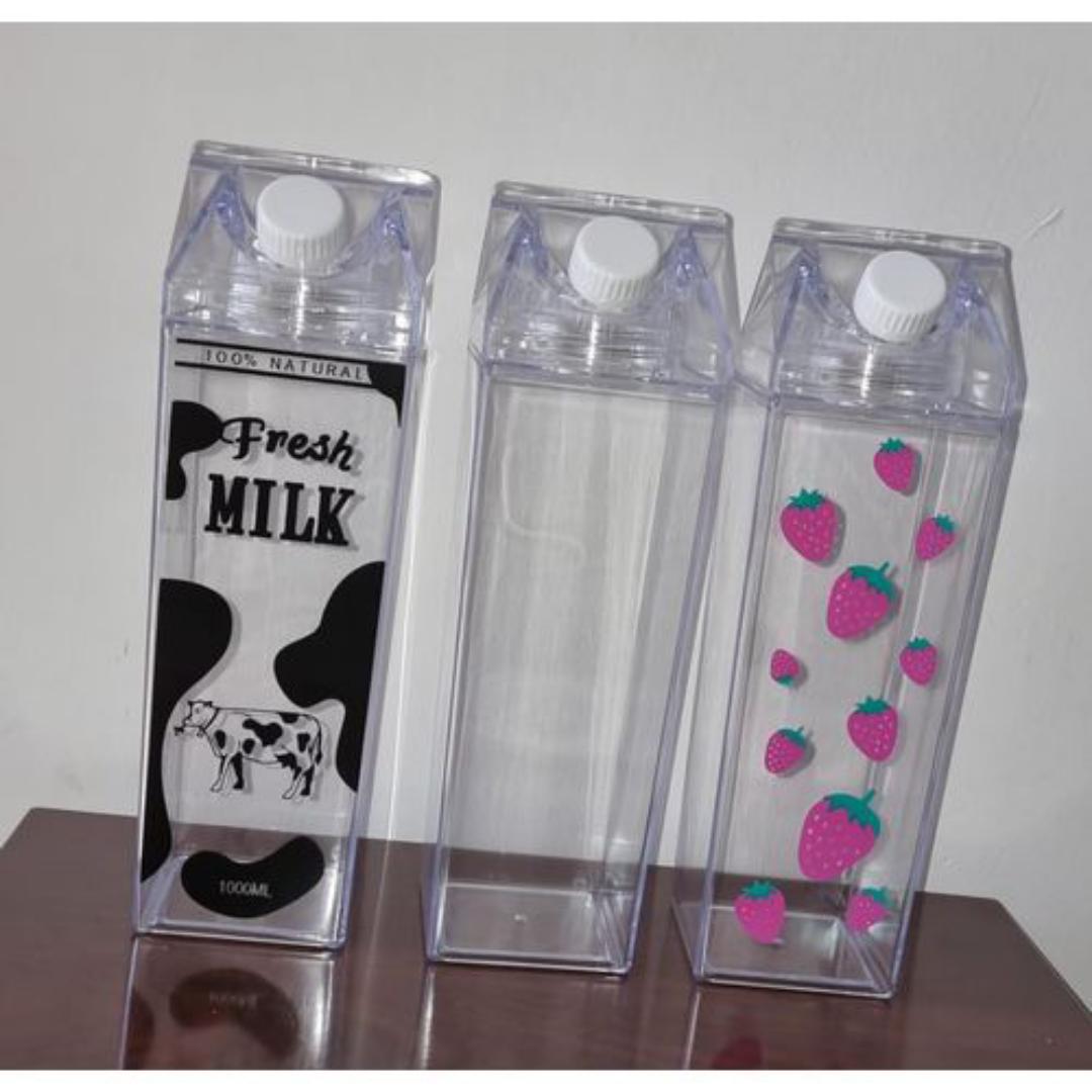 1L acrylic fridge bottle with tight duo lid available in 3 1options clear , milk ,  strawberry design