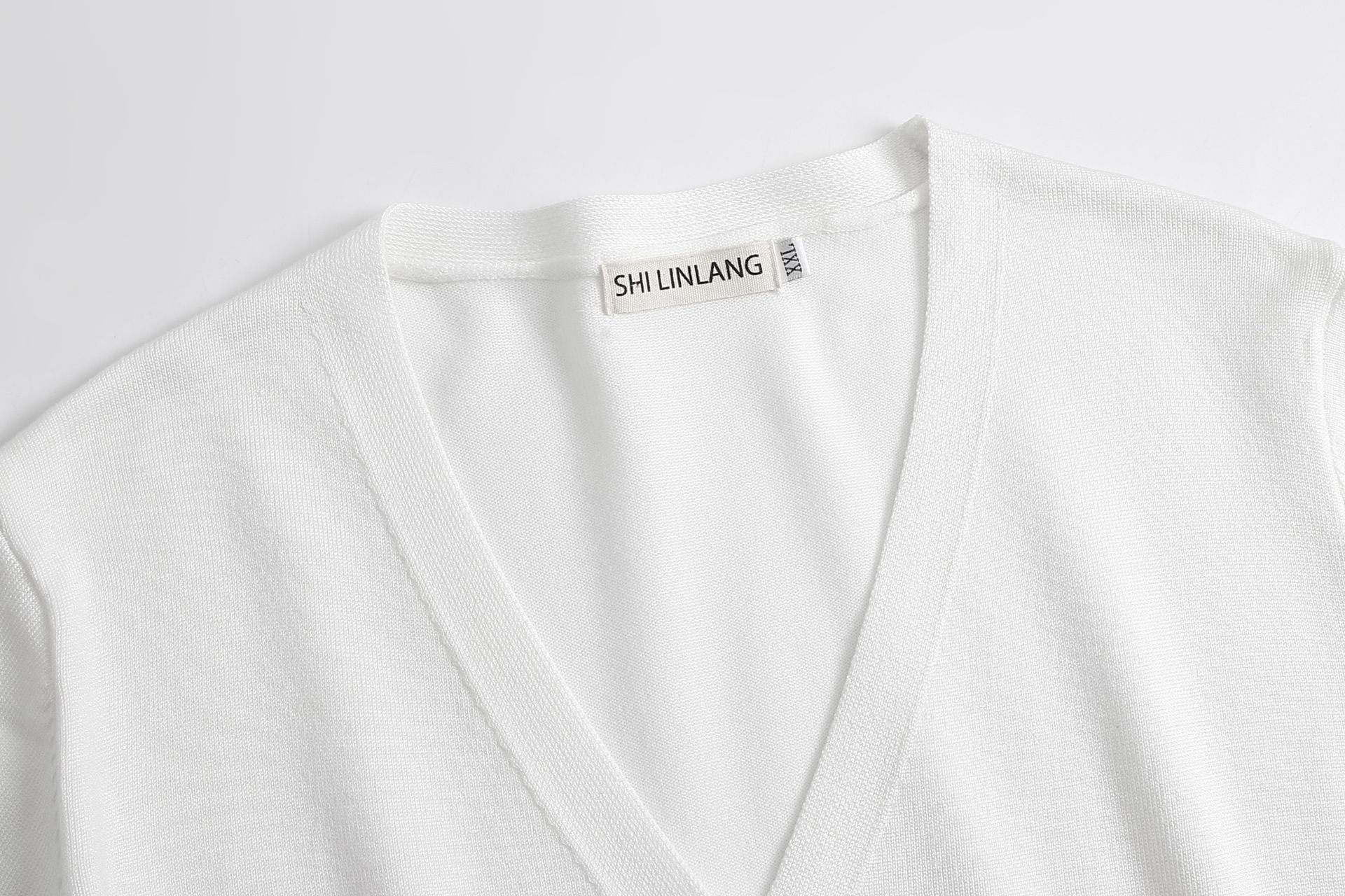 2025 Spring Clothing Long Sleeve Knitted Sweater Solid Color Simple Temperament Cardigan External Wear Women's Sweater Large Coat 200 pounds White M