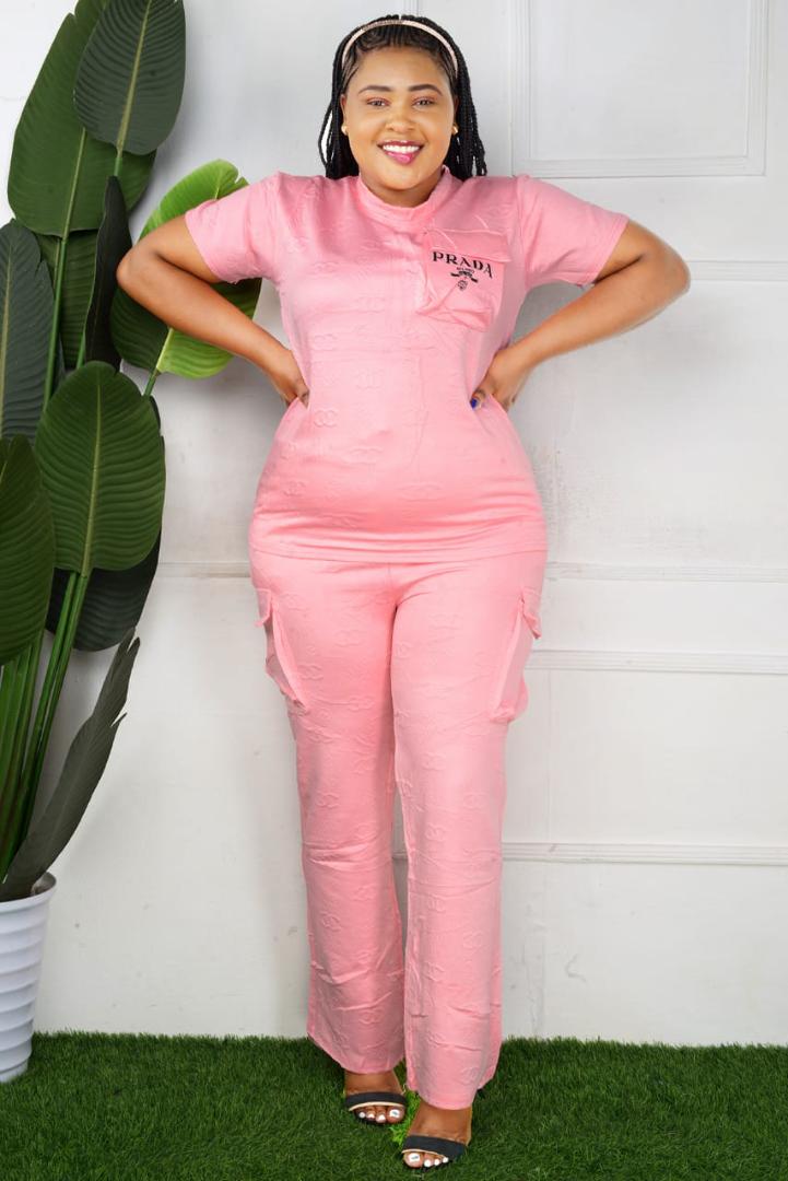 "Luxuriously Tailored Full-Length Designer-Inspired Monogram Embossed Satin Cargo Jumpsuit Featuring Elegant Short Sleeves, High-Cinched Waist, and Functional Utility Pockets