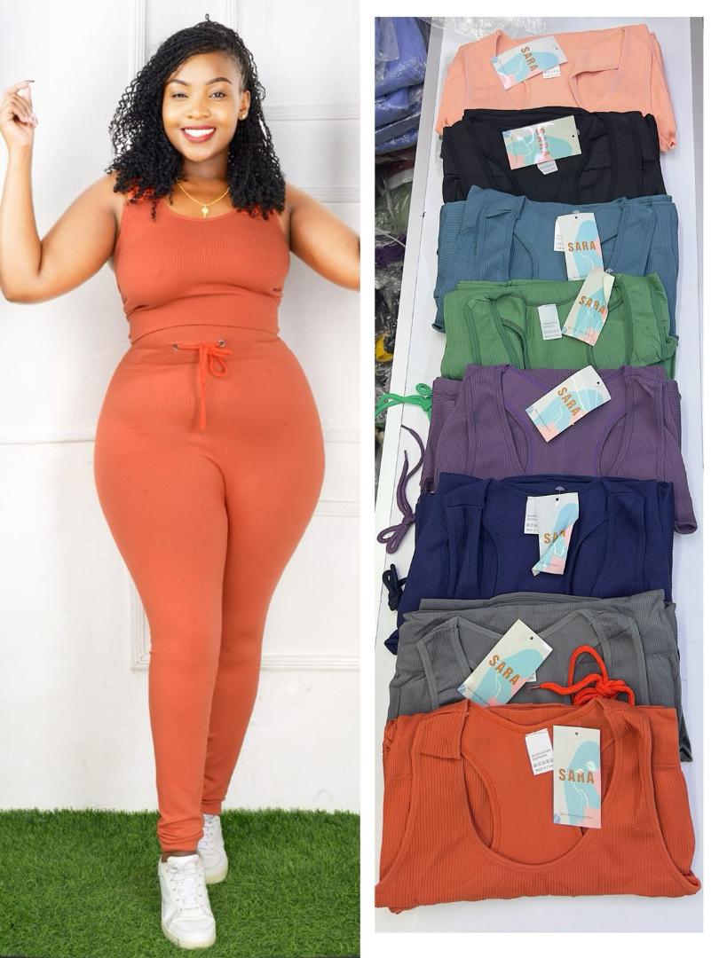 SleekFit All-Black Stretchy Ribbed Long Sleeve Crop Top and High-Waisted Body-Shaping Leggings Activewear Set for Gym, Daily Wear, and Street Style