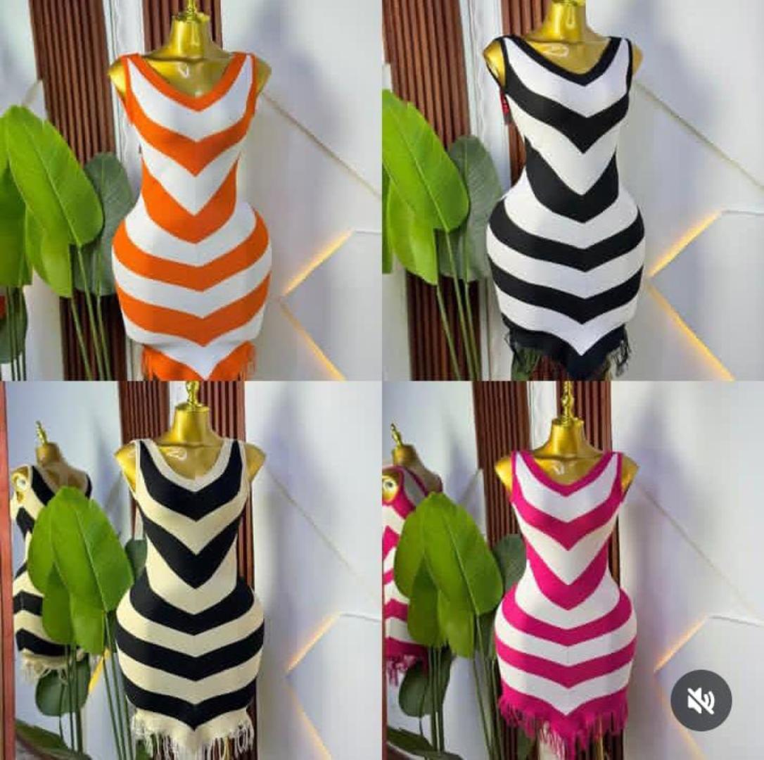 The Allure Curve-Defining Chevron Muse Bodycon Mini Dress Collection – Sleeveless V-Neck Sculpting Knit Dress with Bold Zigzag Stripe Illusion and Playful Fringe Hem Detailing