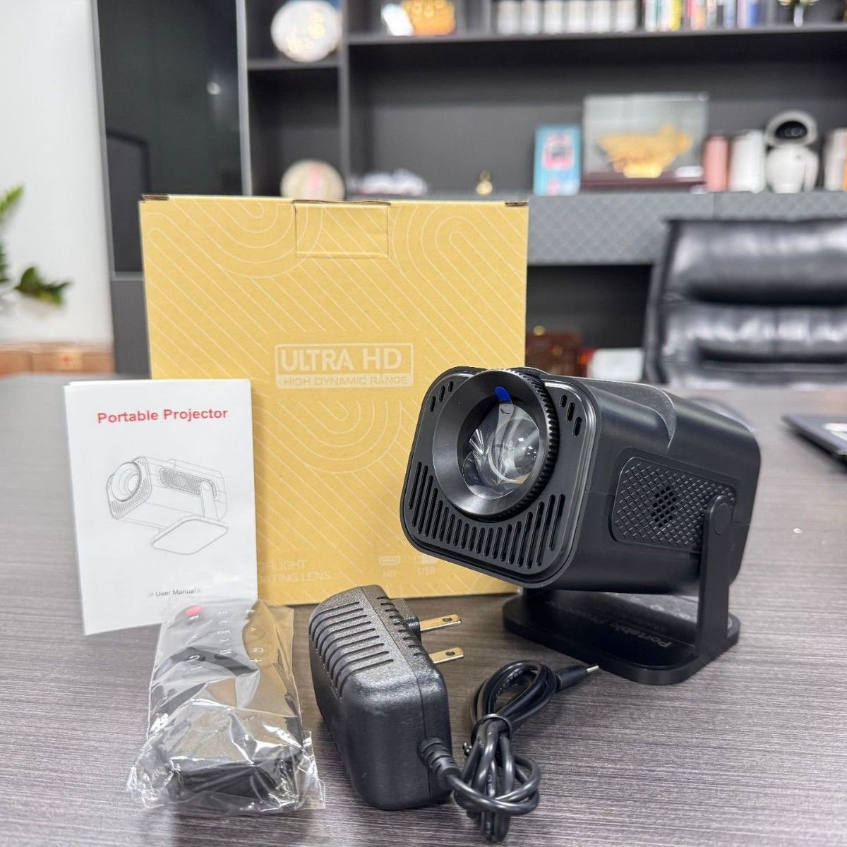 The new hy320 mini home projector offers ultra-high-definition short-throw projection for wall-mounted home cinema.