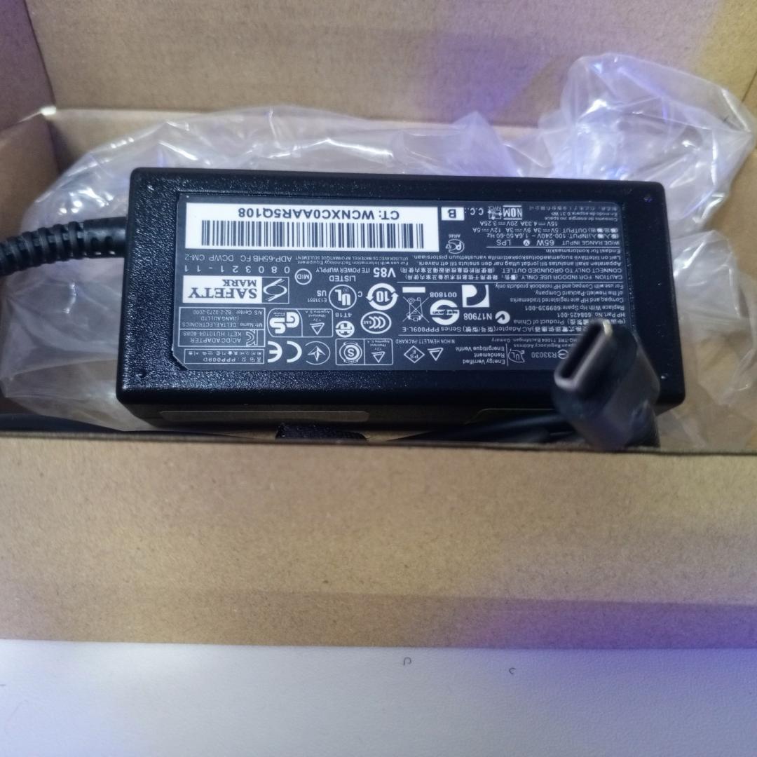 Universal type C charger Complete (with power flower cable) for use in different laptop models ie, HP, Dell, Lenovo etc.