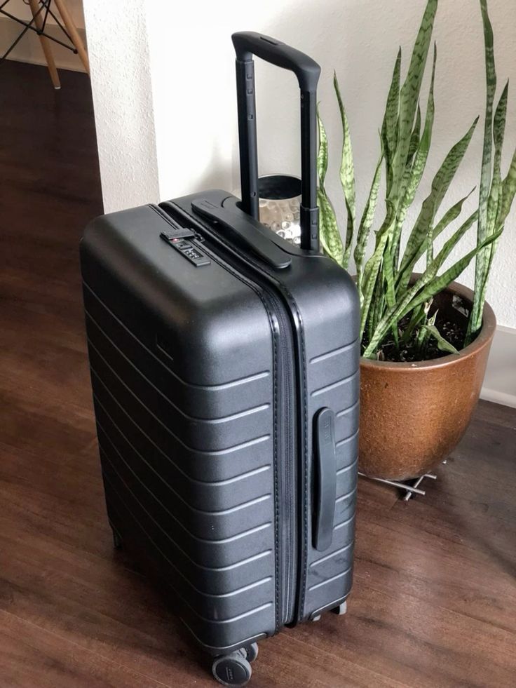 SUITCASE - BLACK RUBBER UNBREAKABLE, MEDIUM  AND ULTRA DURABLE
