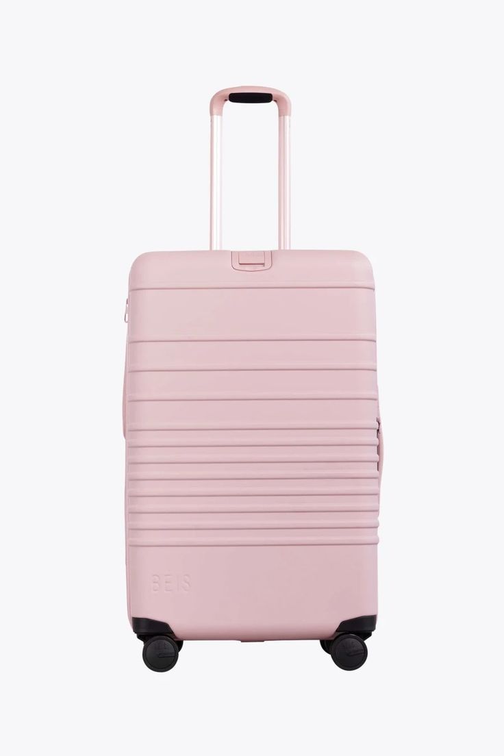 SUITCASE - RUBBER UNBREAKABLE PEACH PINK LARGE SUITCASE LUXURIOUS HIGH QUALITY.  Made of durable Polypropylene material. Lightweight and easy to transport.