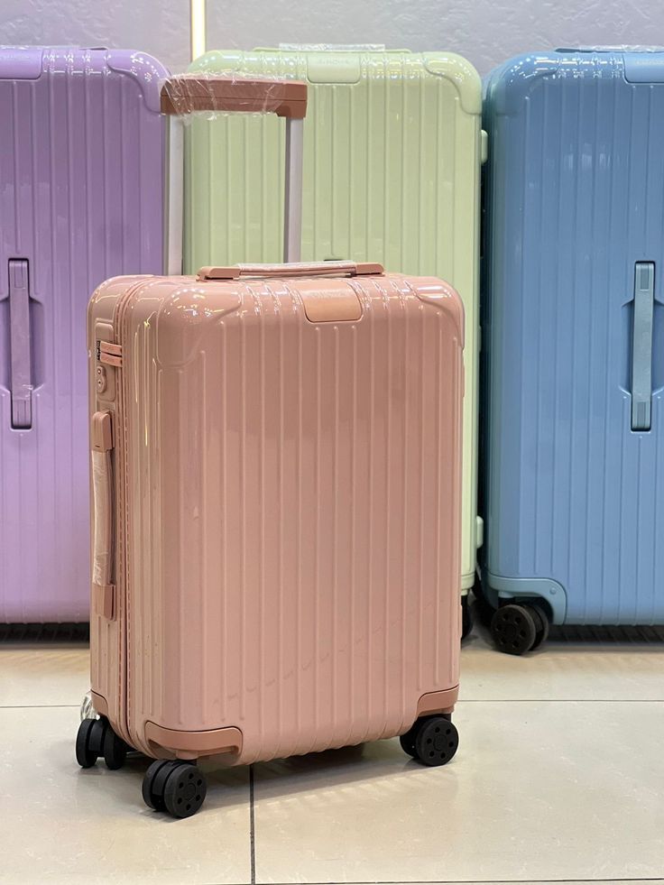 SUITCASE - RUBBER UNBREAKABLE PEACH PINK LARGE SUITCASE LUXURIOUS HIGH QUALITY.  Made of durable Polypropylene material. Lightweight and easy to transport.