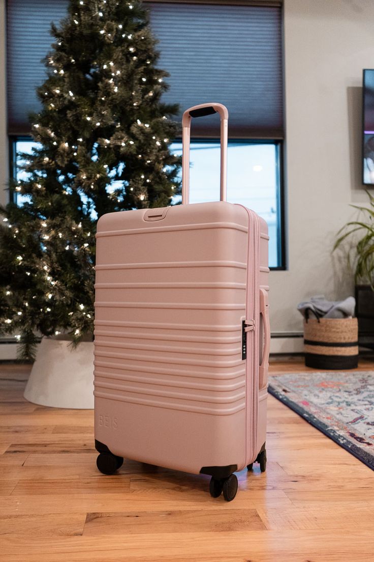 SUITCASE - RUBBER UNBREAKABLE PEACH PINK LARGE SUITCASE LUXURIOUS HIGH QUALITY.  Made of durable Polypropylene material. Lightweight and easy to transport.