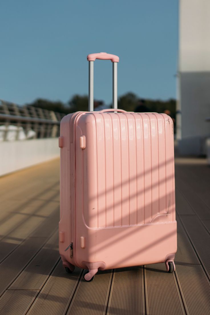 SUITCASE - RUBBER UNBREAKABLE PEACH PINK LARGE SUITCASE LUXURIOUS HIGH QUALITY.  Made of durable Polypropylene material. Lightweight and easy to transport.