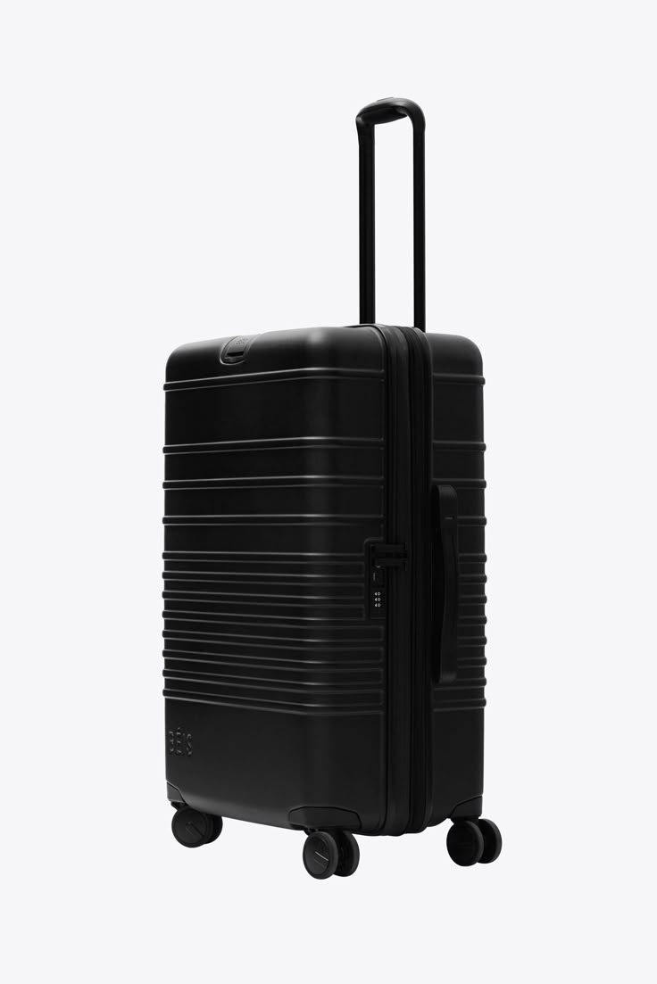 SUITCASE -  BLACK MEDIUM 20KG RUBBER UNBREAKBLE ANTISCRATCH TRAVEL BAG.