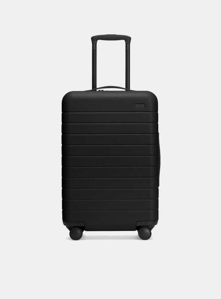 SUITCASE -  BLACK MEDIUM 20KG RUBBER UNBREAKBLE ANTISCRATCH TRAVEL BAG.