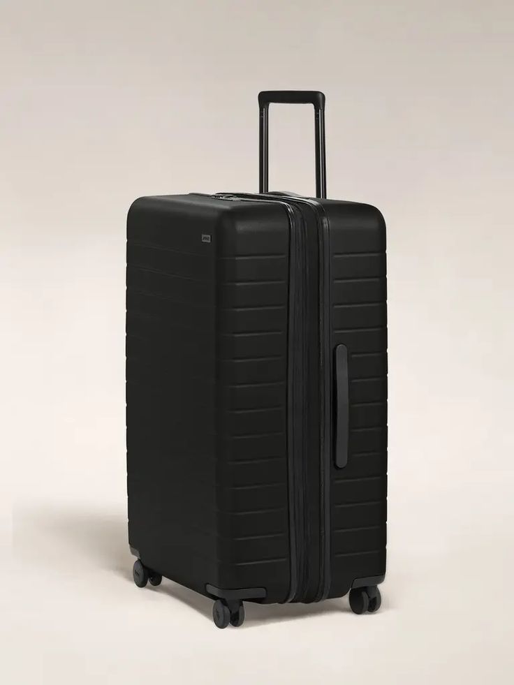 LARGE SIZE 30 SUITCASE- BLACK EXTRA LARGE 30kgs SIZE 1. Strong. Spacious. Unbreakable. crafted with impact-resistant hard shell, smooth 360° spinner wheels, secure TSA-style locks.