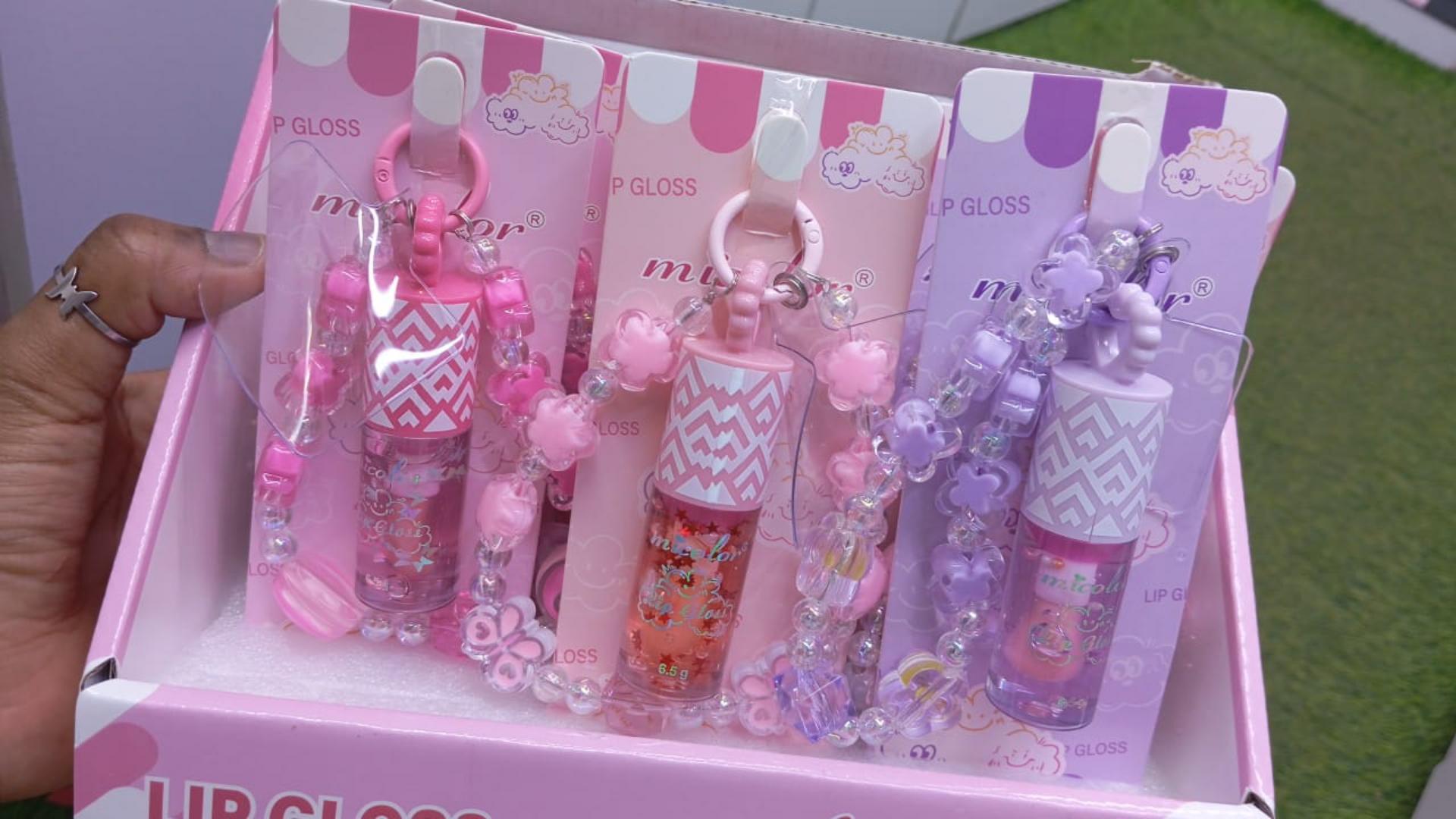 Phone charm with phone lanyard and a portable pendant lip gloss, Butterfly Heart Moisturizing Lip Oil, Cute Daily Warm-Tone Color-Changing Star Glitter Gel Lip Gloss, Portable Hanging Design.