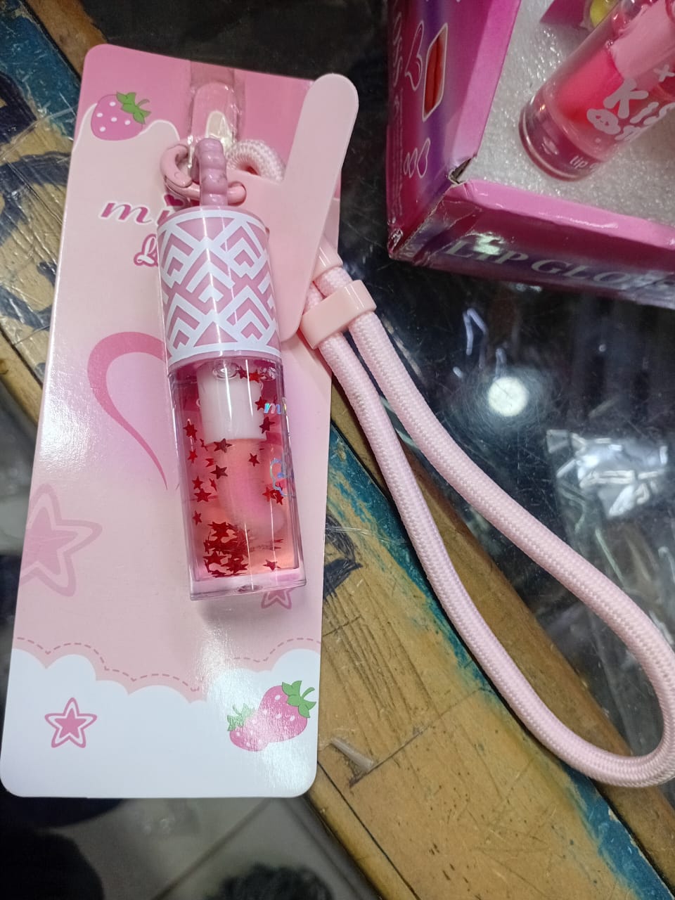 Phone charm with phone lanyard and a portable pendant lip gloss, Butterfly Heart Moisturizing Lip Oil, Cute Daily Warm-Tone Color-Changing Star Glitter Gel Lip Gloss, Portable Hanging Design.