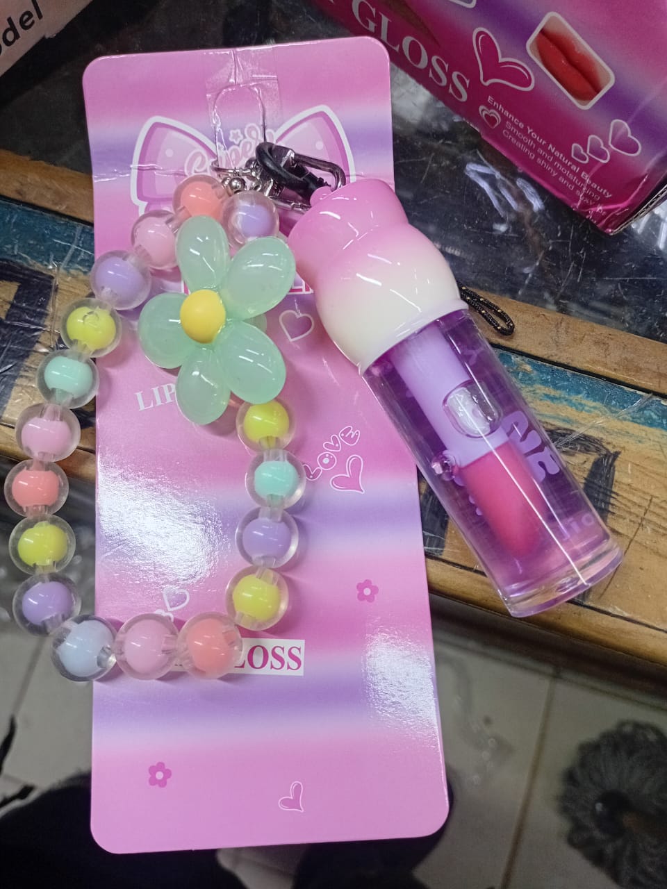 Phone charm with phone lanyard and a portable pendant lip gloss, Butterfly Heart Moisturizing Lip Oil, Cute Daily Warm-Tone Color-Changing Star Glitter Gel Lip Gloss, Portable Hanging Design.