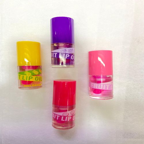 Kiss Beauty Fruit Lip Oil with a stunning pink tint. Indulge your lips. Experience nourishing hydration and a beautiful, vibrant finish that enhances your natural beauty! view 2