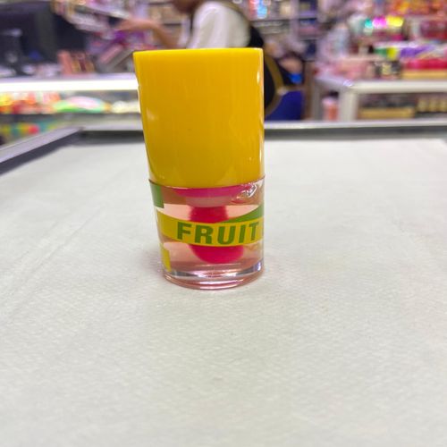 Kiss Beauty Fruit Lip Oil with a stunning pink tint. Indulge your lips. Experience nourishing hydration and a beautiful, vibrant finish that enhances your natural beauty! view 3