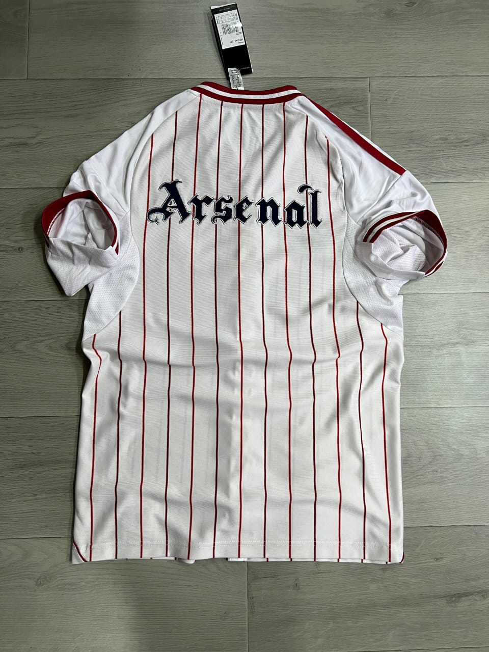 Baseball Unisex Jersey. Step out in true fan style with this Baseball Unisex Jersey, blending classic sports fashion with modern comfort. Designed in the iconic pinstripe colorway, this jersey offers