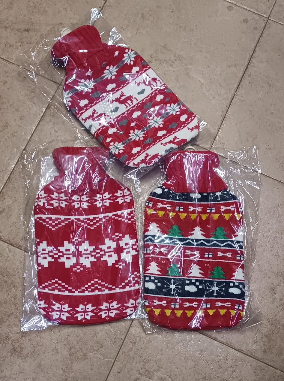 2L PVC RUBBER HOT WATER BAG / COMPRESS HOT WATER BOTTLE WITH KNITTED COVER. Ideal For cramps.Experience comfort with our 2L hot water bottle made of PVC material. It's odorless, non-toxic, and BPA-fre