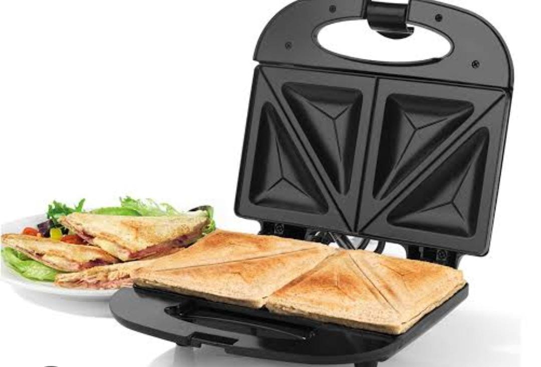 🫚🪐Electrical Multifunction breakfast machine sandwich maker.Non stick cooking plates for easy cleaning 
Power on and ready indicator lights
Cool touch housing with locking clip
Power : 750W