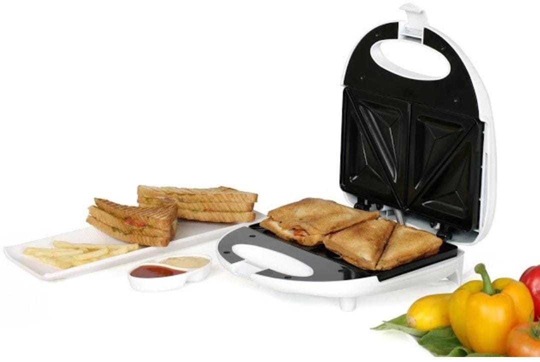 🫚🪐Electrical Multifunction breakfast machine sandwich maker.Non stick cooking plates for easy cleaning 
Power on and ready indicator lights
Cool touch housing with locking clip
Power : 750W
