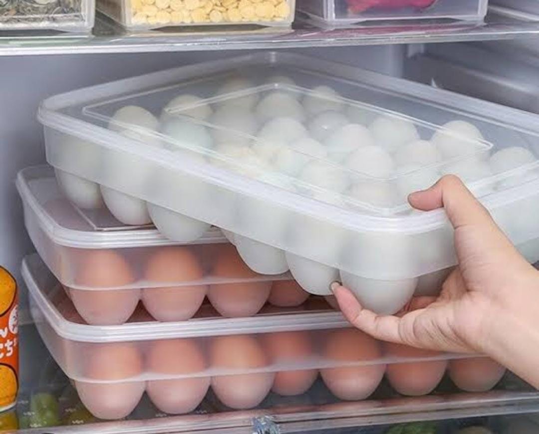 34 Eggs PCs Egg tray storage container/ Egg Holder with Lid. Moisture proof 
       Fits up to 34 eggs     
      Can be put at a refrigerator
      Made of plastic
     Carry them everywhere without