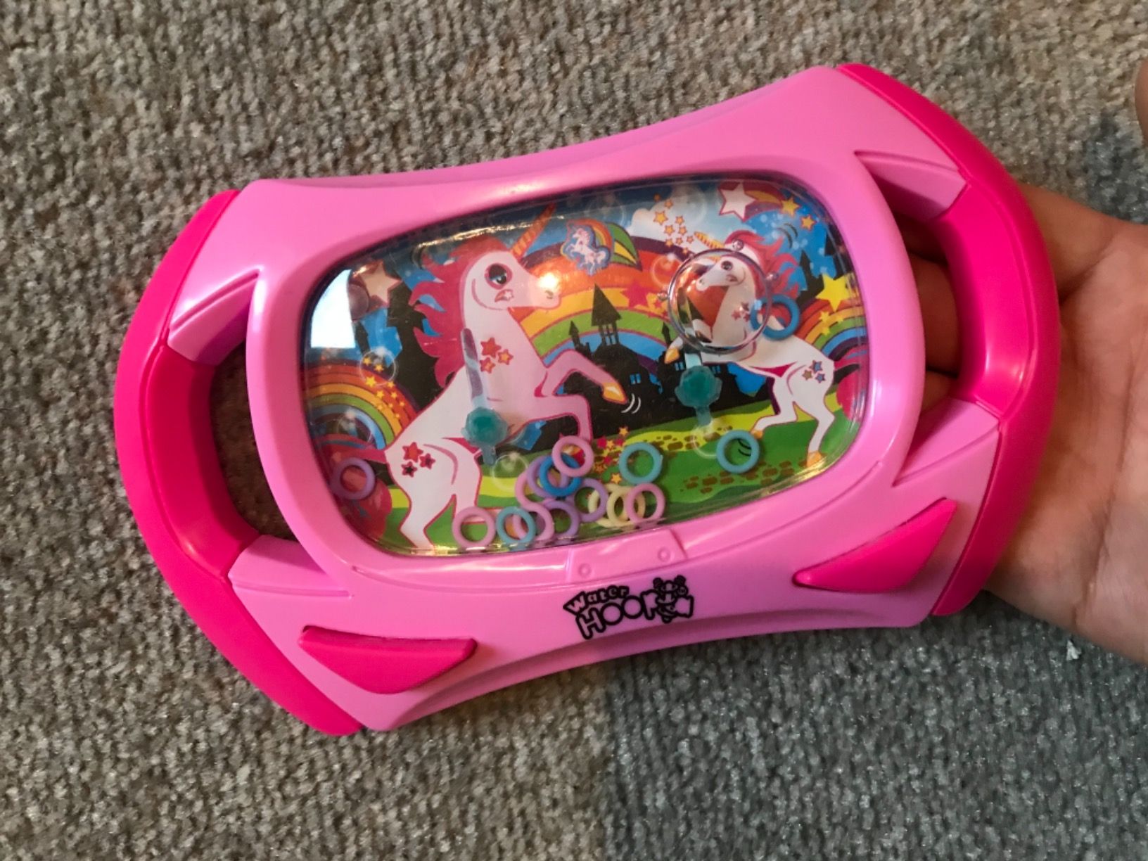 Water Hoopla - Unicorn from Deluxebase. Unicorn Themed Handheld Ring Toss Games for Kids. Portable Retro Water Hoopla Mini Arcade Games. Great for Travel Toys, Mini Games and Unicorn Party Favors.