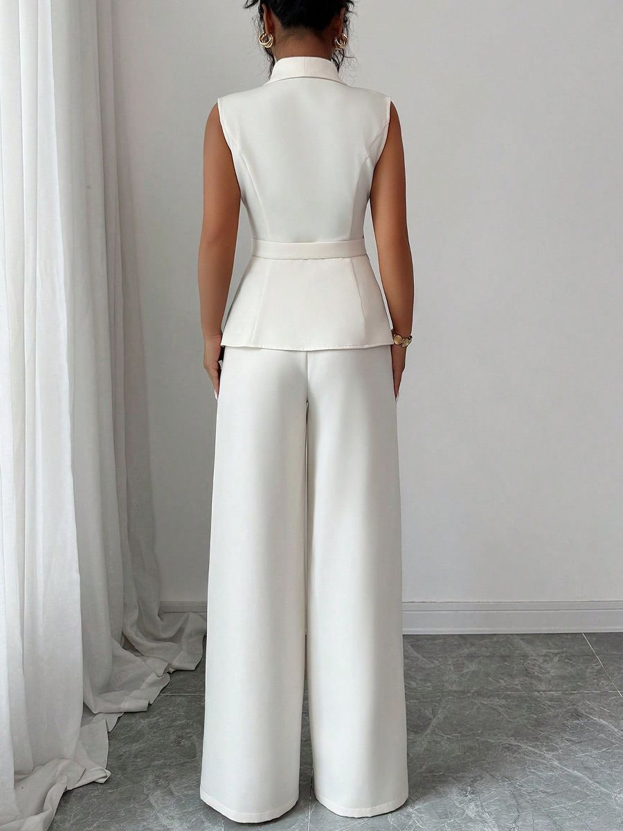 2pcs Set New spring/fall women's set  fashion sophistication. Designed with a solid-color vest and straight-leg pants,corporate professionals attending executive meetings or hosting company events.