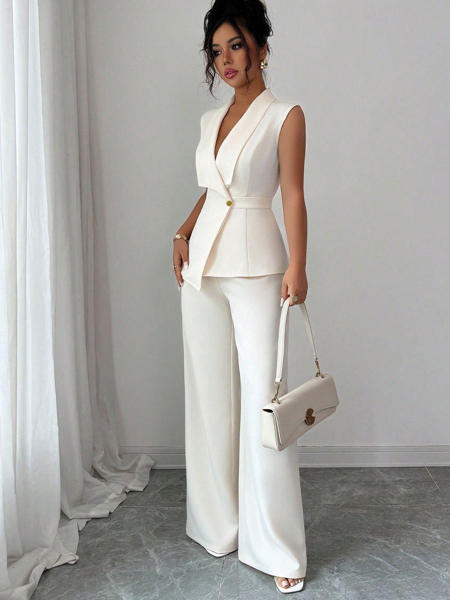 2pcs Set New spring/fall women's set  fashion sophistication. Designed with a solid-color vest and straight-leg pants,corporate professionals attending executive meetings or hosting company events.