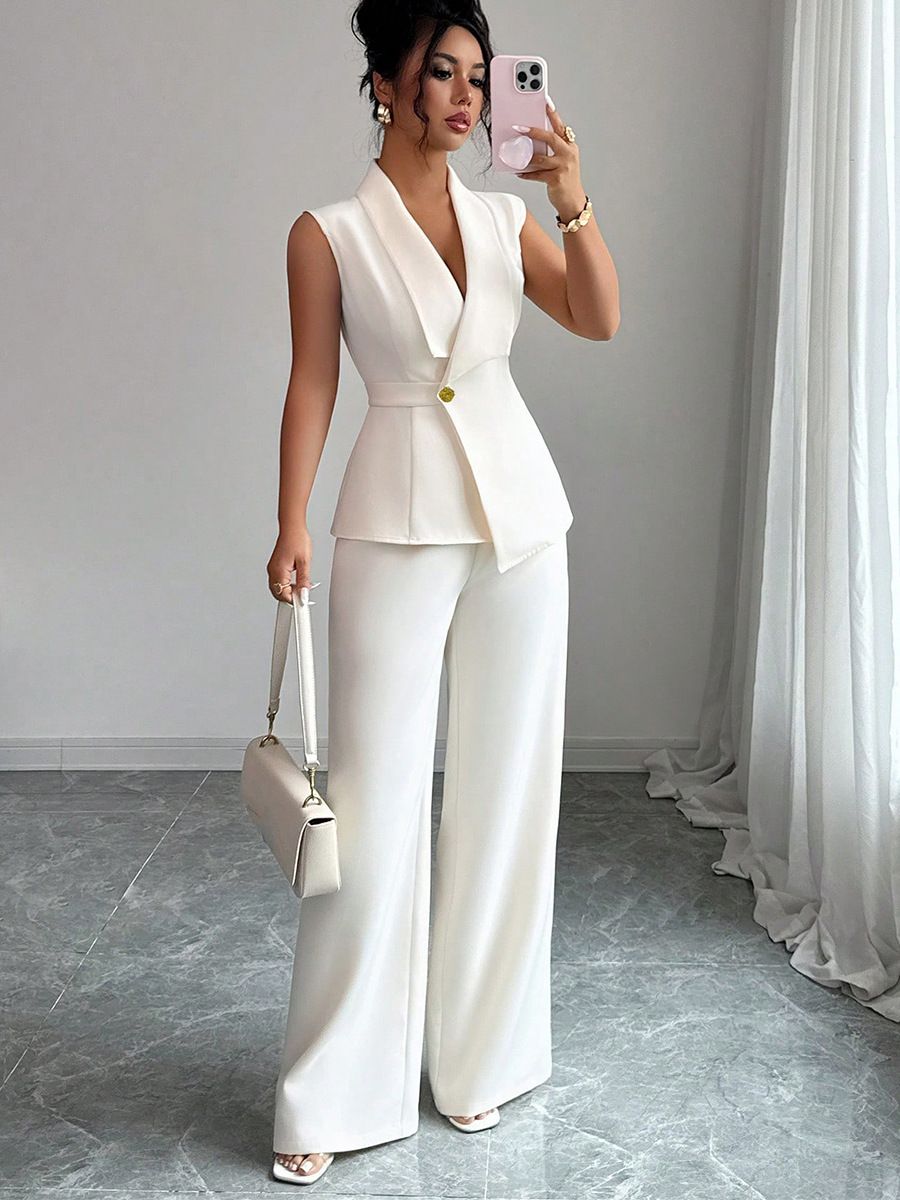 2pcs Set New spring/fall women's set  fashion sophistication. Designed with a solid-color vest and straight-leg pants,corporate professionals attending executive meetings or hosting company events.