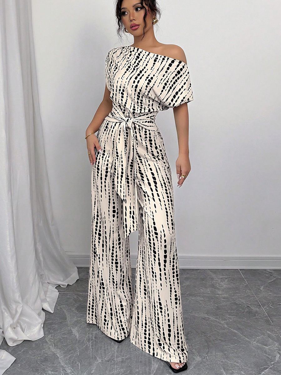 New summer women's jumpsuit refined elegance with an off-shoulder design and striped print. elastic waistband and tailored long pants, perfect for daily commuting, travel, dates, and photo shoots.