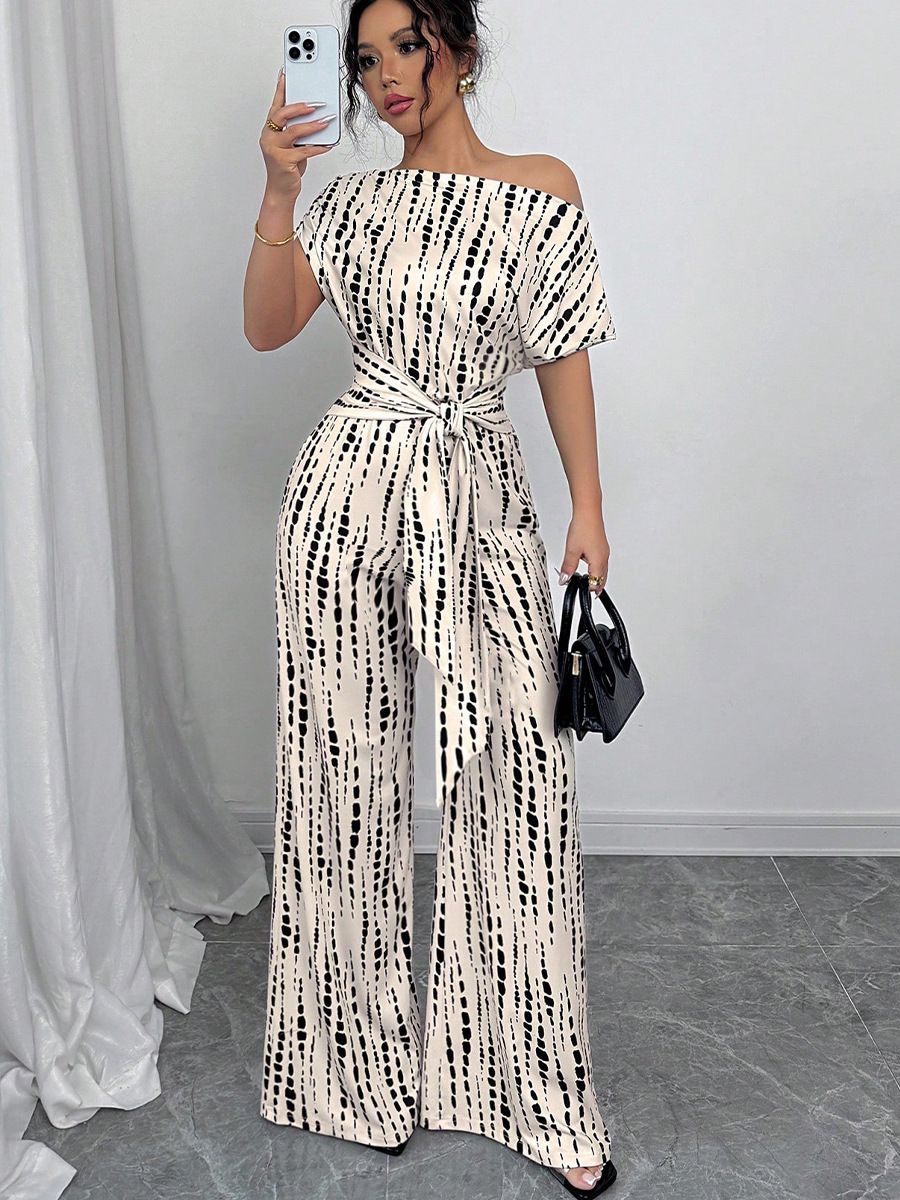 New summer women's jumpsuit refined elegance with an off-shoulder design and striped print. elastic waistband and tailored long pants, perfect for daily commuting, travel, dates, and photo shoots.