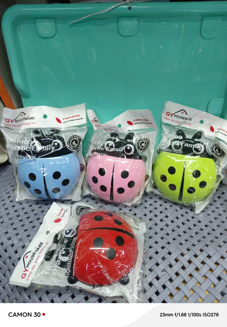 TOOTHBRUSH HOLDER. Ladybird Wall-Mounted Toothbrush Holder, Strong suction cup for easy, drill-free mounting, Durable, eco-friendly plastic construction, Easy to clean and reposition