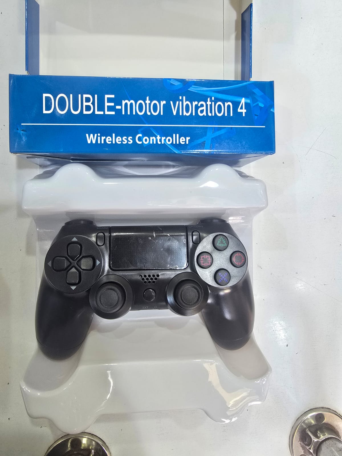 Double-Motor Vibration 4 Wireless Controller designed for the PlayStation 4. 
Features: Includes dual vibration motors for immersive feedback, a built-in touchpad, and an integrated light bar.
Connect