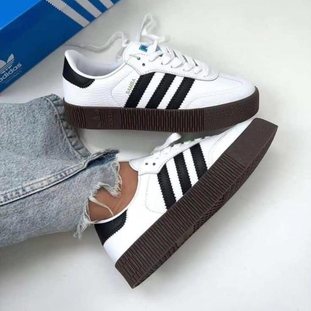 Original Adidas Samba Double Sole - Black"
Upgrade your style with the Adidas Samba Double Sole in black. Designed with premium leather,  iconic 3-Stripes, and a thick rubber sole for extra comfort .