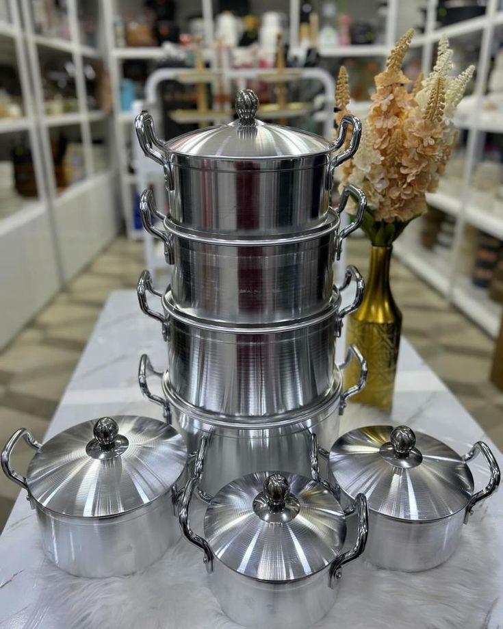 TORNADO TC 14PIECES Heavy duty Stainless cookware/ Aluminium sufuria with Lids-Silver 7POTS AND 7 LIDS.