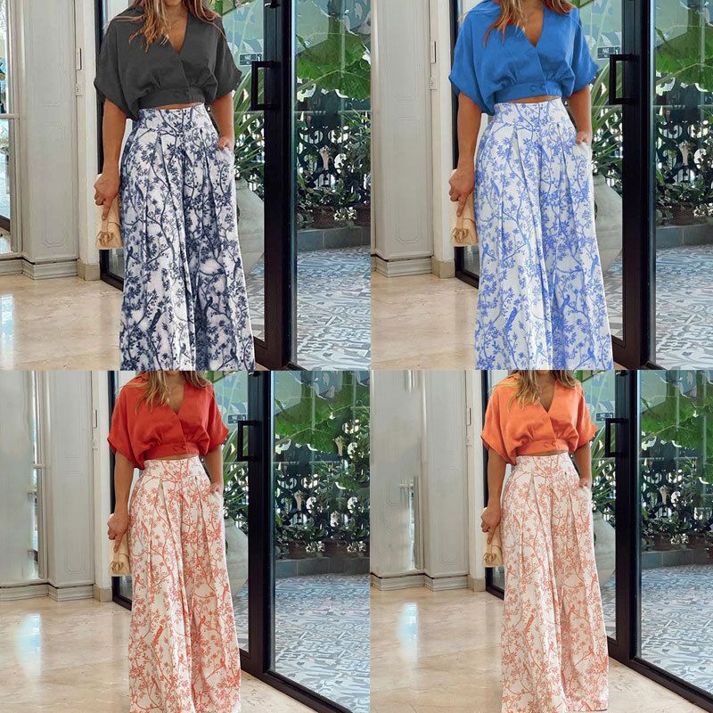 Summer new women's two-piece fashion elegant solid color short-sleeved V-neck shirt top with mid-waist printed wide-leg trousers suit is suitable for daily leisure and holiday commuting.