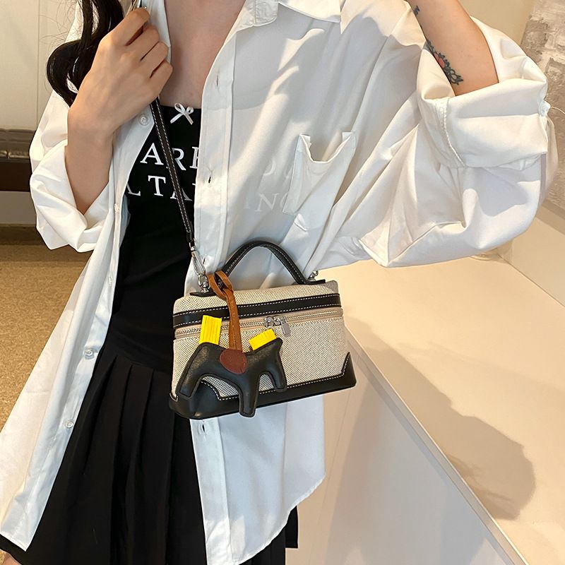 New handbag fashion canvas box bag Joker handbag slung shoulder bag is suitable for daily leisure commuting party.