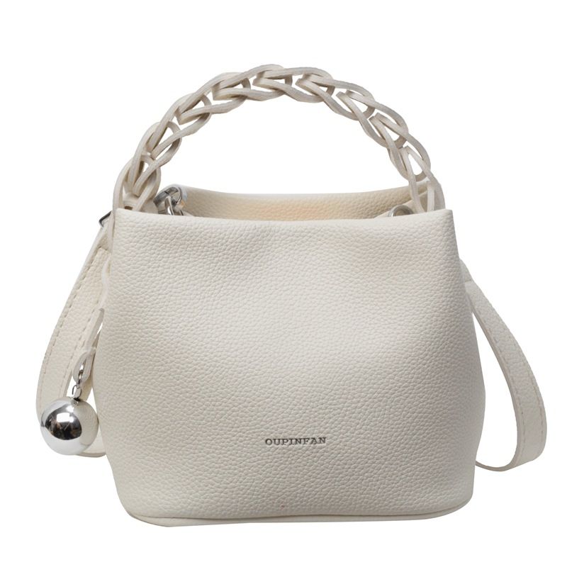The new handbag fashion portable bucket bag lychee pattern large-capacity shoulder messenger bag is suitable for daily leisure commuting parties.