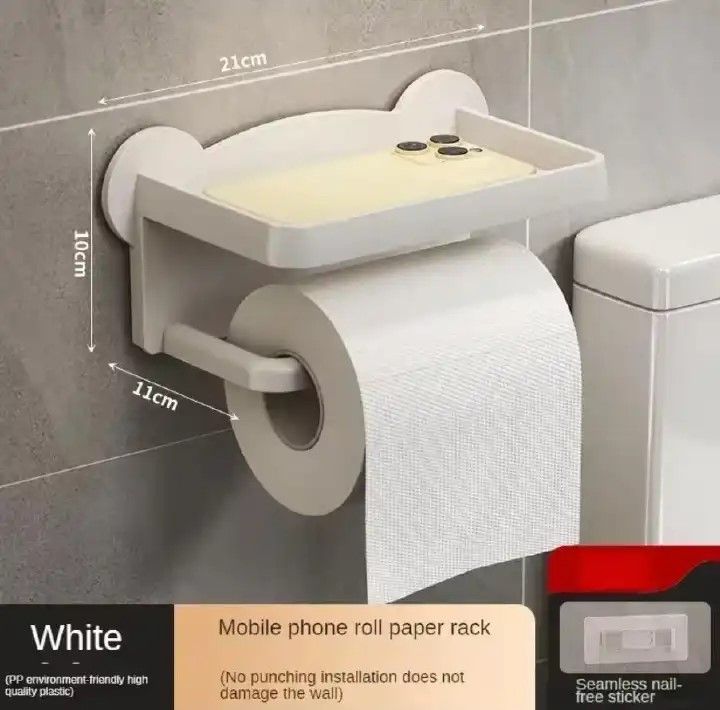 Punch-Free Toilet Tissue Holder – Wall-Mounted Paper Roll Dispenser (Grey, Black, White).▪️ No drilling required – mounts easily with strong adhesive tape ▪️ Protects walls and tiles from unnecessary