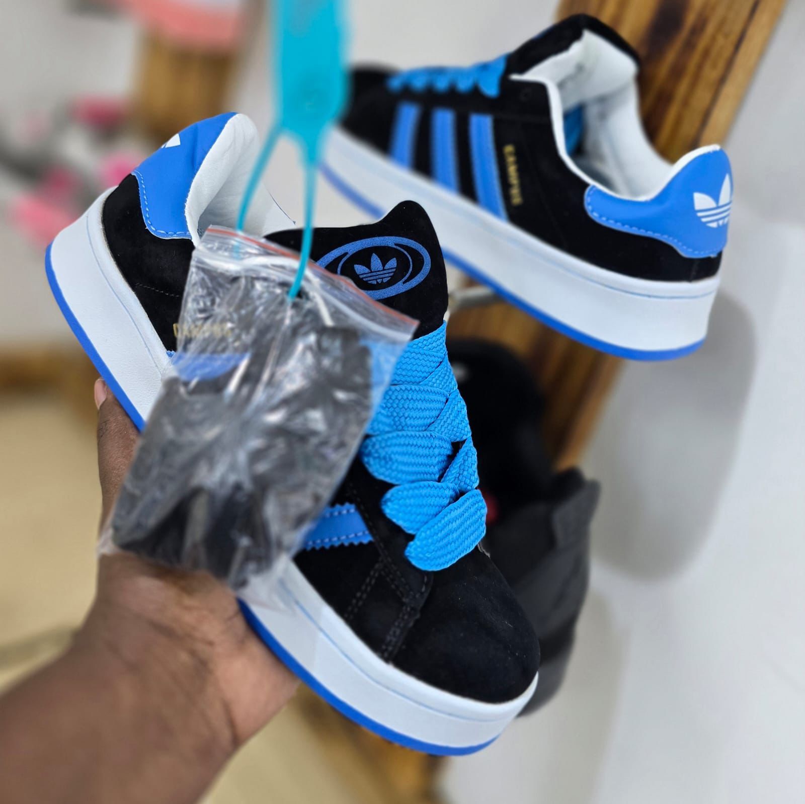 stylish adidas campus available size 37-42 with extra lace
available colours black,black white,blue and pink.