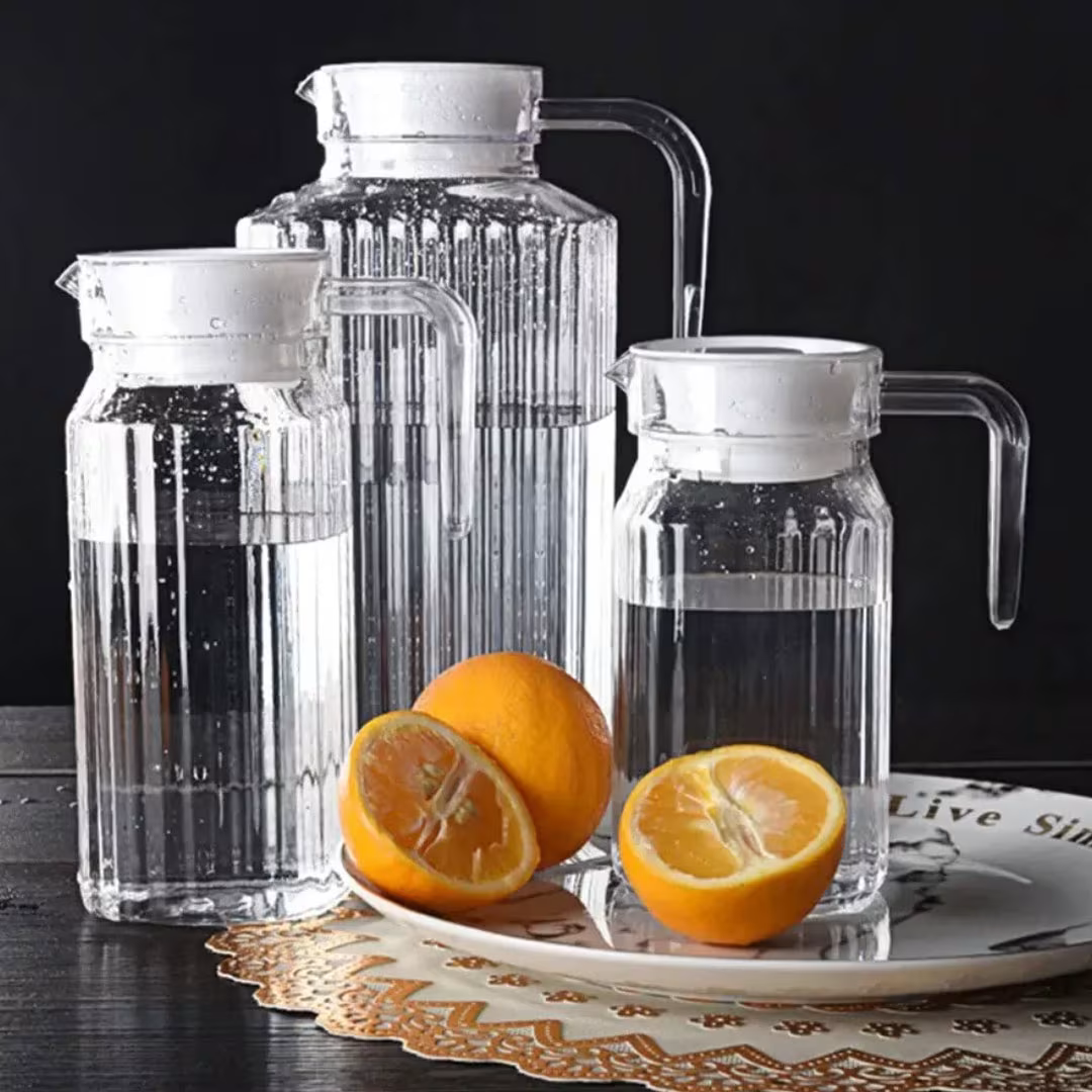 1 pc 1200ml Quadro Glass Fridge Jug. A classic and functional pitcher perfect for water, juice, iced tea, or milk. Designed for both aesthetics and convenience, this jug fits neatly in the fridge.