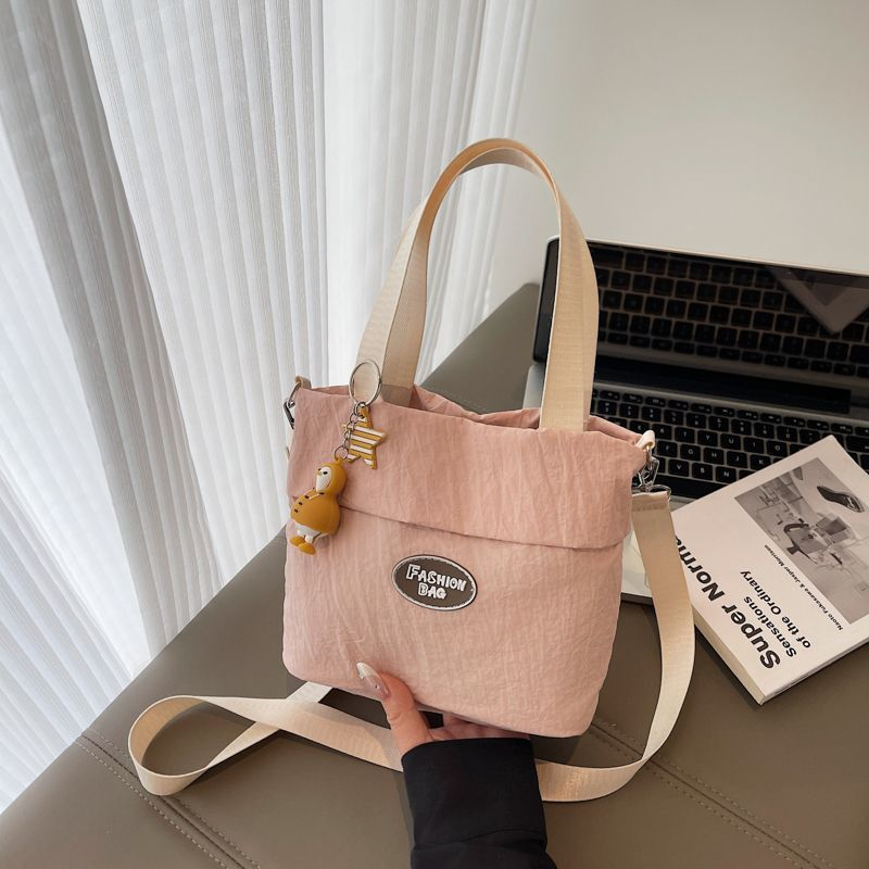 Stylish women's shoulder bags 2025 Large capacity student tote bag New canvas commuter handbag Women's eco-bag Cute canvas bag Women's handbag shoulder bag Japanese Harajuku crossbody bag Girls' small