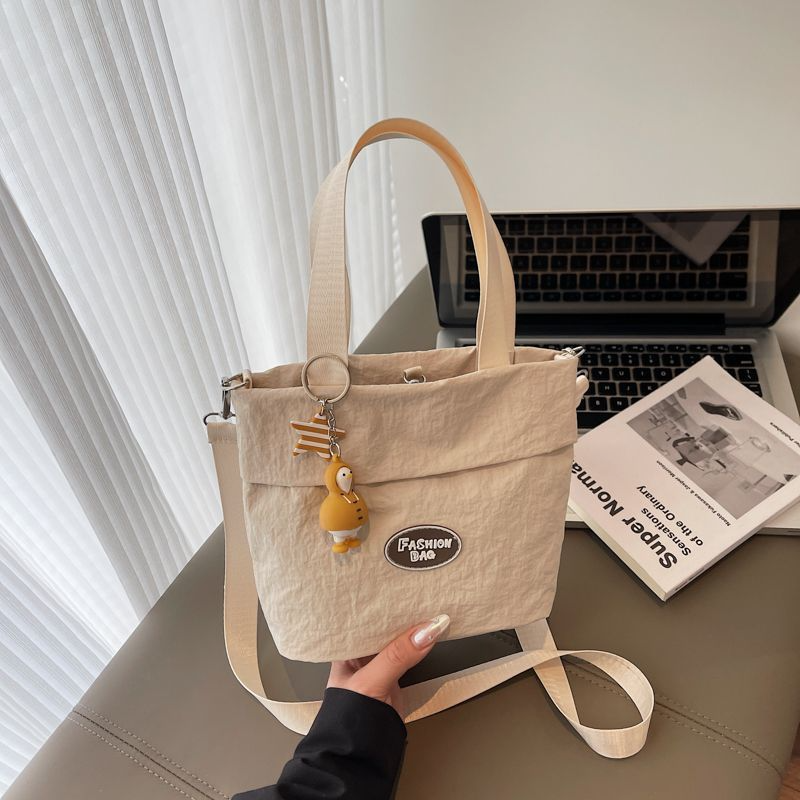 Stylish women's shoulder bags 2025 Large capacity student tote bag New canvas commuter handbag Women's eco-bag Cute canvas bag Women's handbag shoulder bag Japanese Harajuku crossbody bag Girls' small