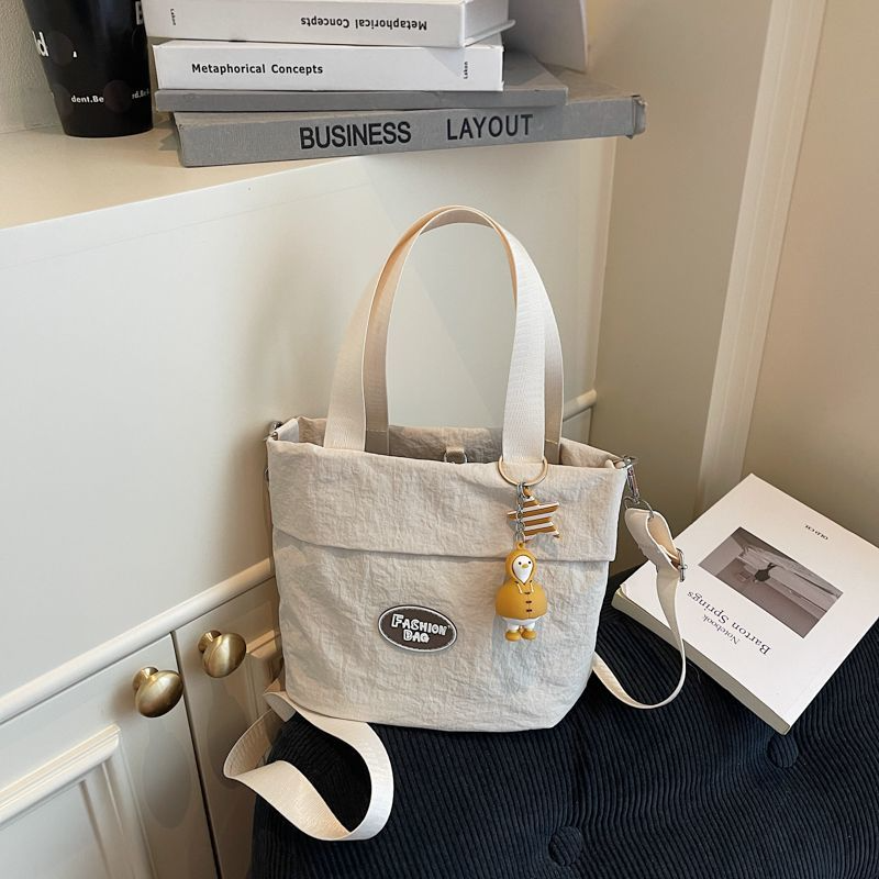 Stylish women's shoulder bags 2025 Large capacity student tote bag New canvas commuter handbag Women's eco-bag Cute canvas bag Women's handbag shoulder bag Japanese Harajuku crossbody bag Girls' small