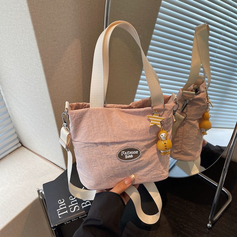 Stylish women's shoulder bags 2025 Large capacity student tote bag New canvas commuter handbag Women's eco-bag Cute canvas bag Women's handbag shoulder bag Japanese Harajuku crossbody bag Girls' small